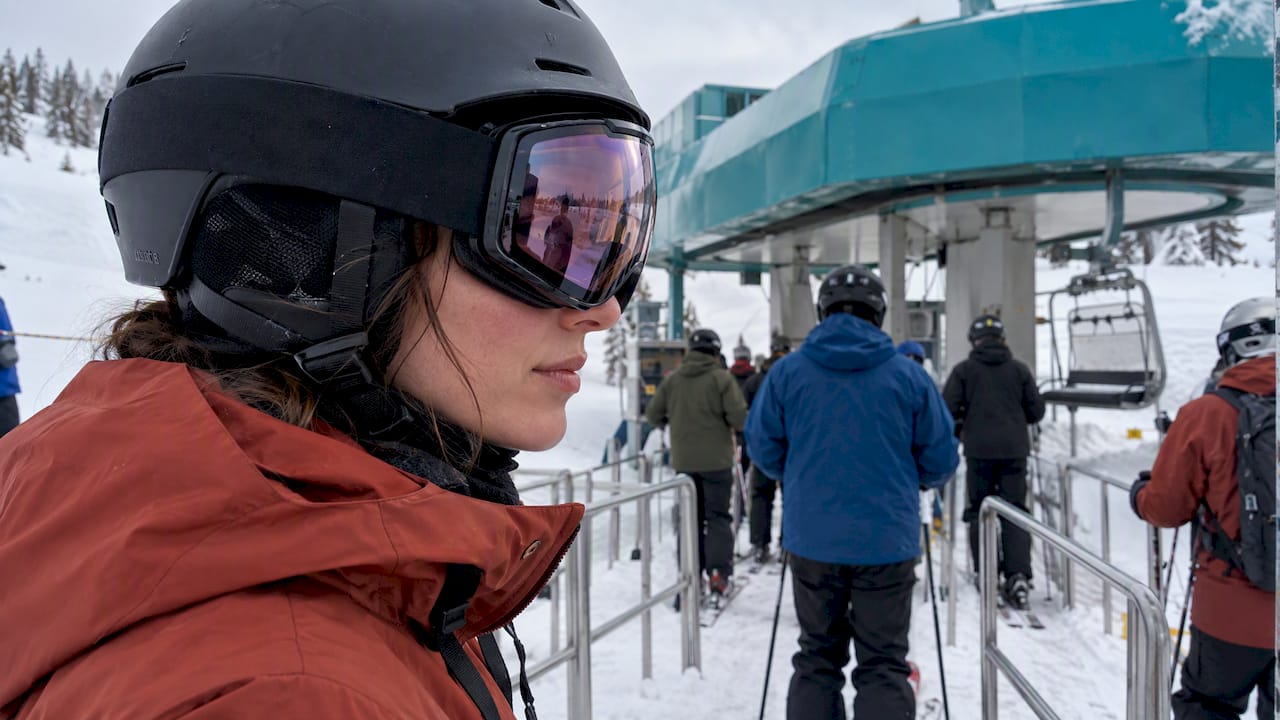 Skier wearing dual pane goggles at a lift
